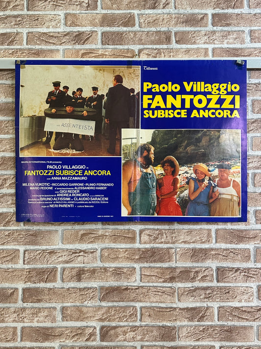 Fotobusta originale di cinema - Fantozzi subisce ancora