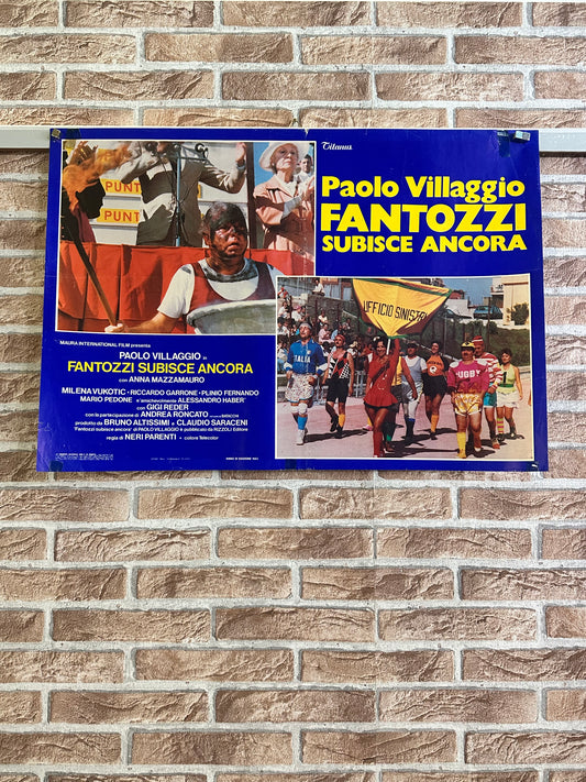 Fotobusta originale di cinema - Fantozzi subisce ancora