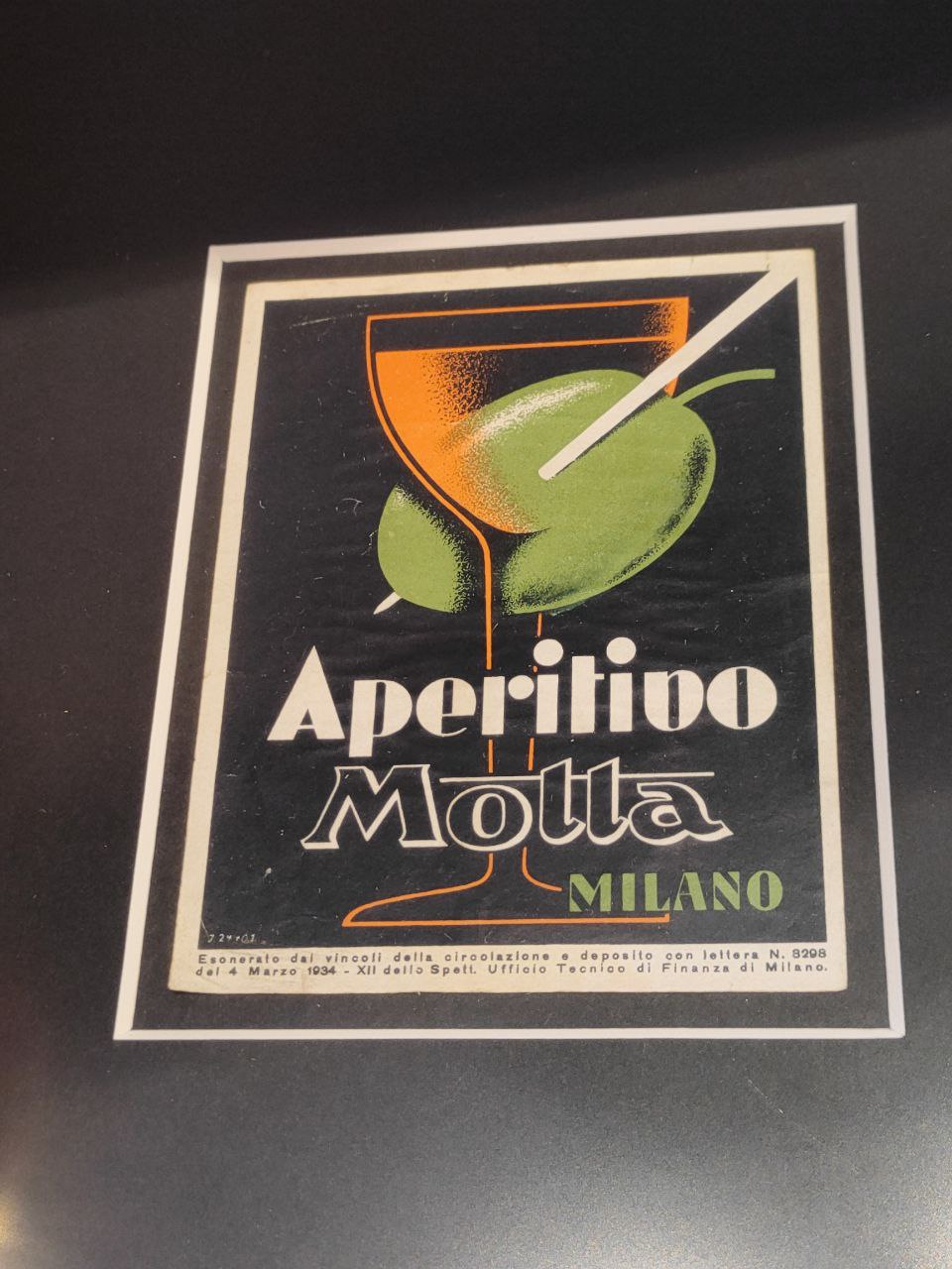 Etichetta pubblicitaria in cornice - Aperitivo Motta, Milano