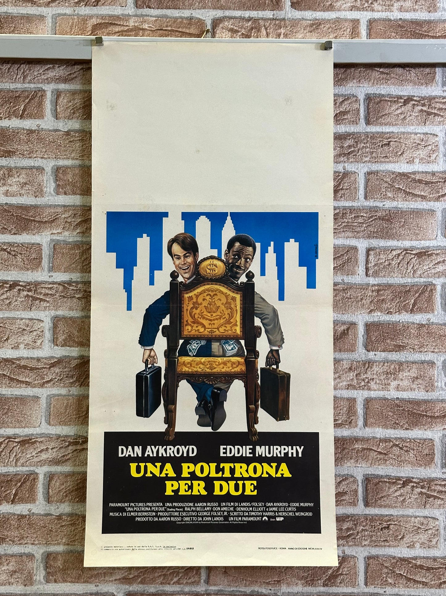 Locandina di cinema - Una poltrona per due