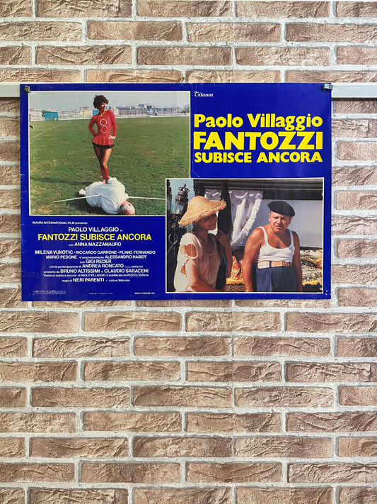 Fotobusta originale di cinema - Fantozzi subisce ancora