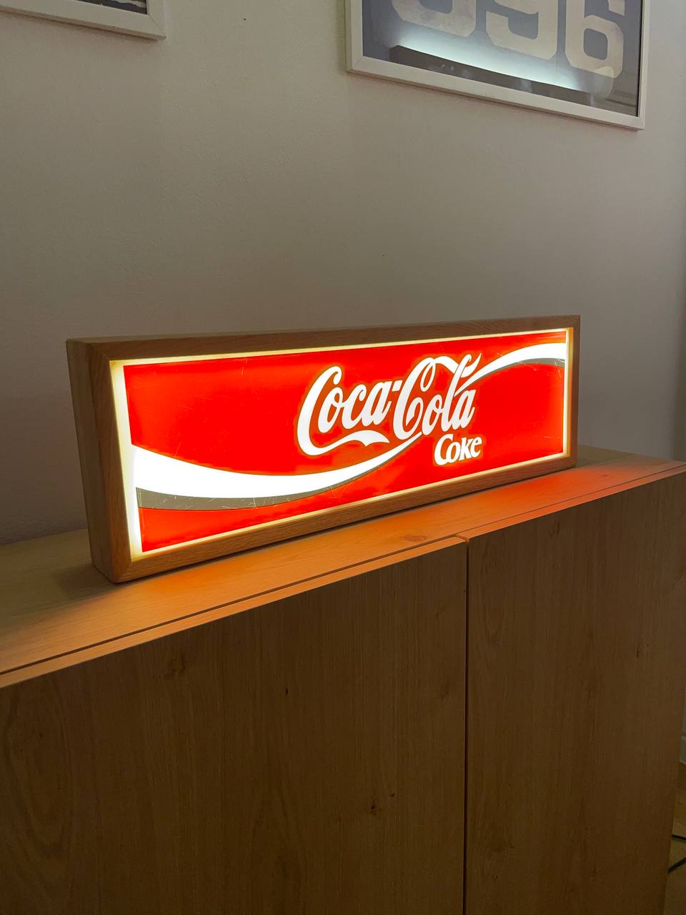 Insegna luminosa Coca Cola