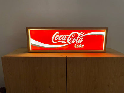 Insegna luminosa Coca Cola